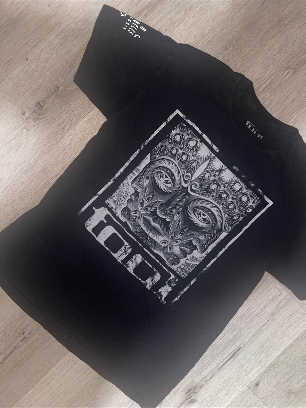 TOOL Black Short-Sleeve Graphic Tee with Intricate Mask Motif | Size Large